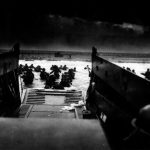 Troops of Company E, 16th Infantry, US 1st Infantry Division approach Fox Green section of Omaha Beach in an LCVP landing craft, Normandy, 6 Jun 1944 (US National Archives: 195515)
