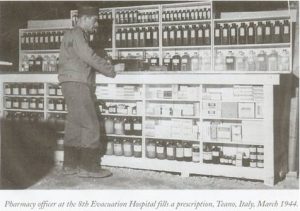 Pharmacist at the US 8th Evacuation Hospital, Teano, Italy, March 1944 (US National Archives)