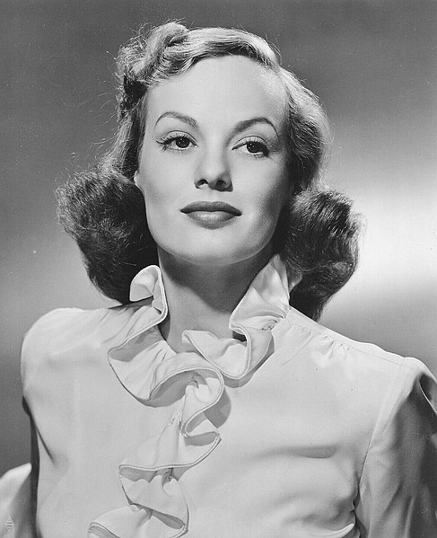Publicity still of actress Faye Emerson, 1943 (public domain via Warner Bros. Studio)