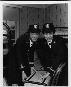 Lt. (j.g.) Harriet Ida Pickens (left) and Ens. Frances Wills close a suitcase after graduating from the Naval Reserve Midshipmen’s School (WR) at Northampton, MA, 21 December 1944. They were the Navy’s first African-American WAVES officers and graduated with the Northampton school’s final class. (U.S. Navy Photograph)