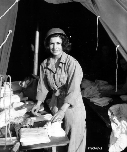 US Army nurse preparing dressings, 15 June 1944, 13th Field Hospital, St.-Laurent-sur-Mer, Normandy (US National Archives)