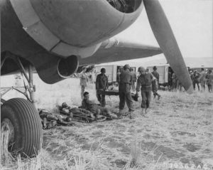 American and Italian wounded at Agrigento, Sicily, await evacuation by plane to Africa for further medical treatment, 25 July 1943 (USAAF photo)
