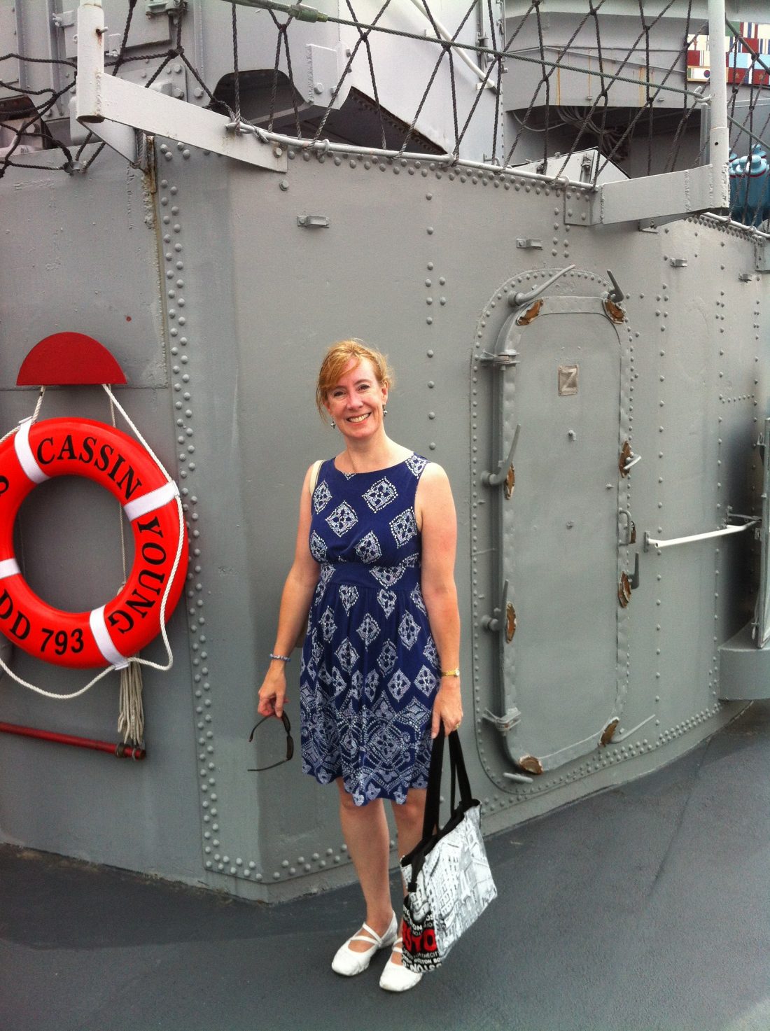 Sarah Sundin by a platform for a 5-inch gun mount on board destroyer USS Cassin Young, Charlestown Navy Yard, Boston, MA (Photo: Sarah Sundin, July 2014)