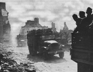 Trucks carry German POWs from the Falaise Pocket, August 1944 (US Army Center of Military History)