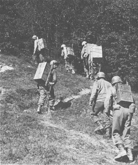 US troops carrying supplies on the Gothic Line (US Army Center of Military History)