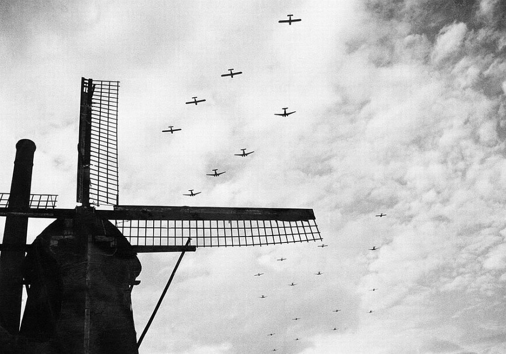 US C-47 Skytrains towing Waco CG-4 gliders over Bergeijk, Holland for the Operation Market Garden landings near Eindhoven, 17 September 1944 (US National Archives)