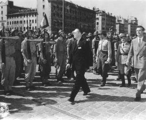 André Diethelm, Jean de Lattre de Tassigny, Emmanuel d’Astier de La Vigerie, and General Monsabert reviewing troops, Marseille, France, 29-31 Aug 1944 (public domain via WW2 Database)