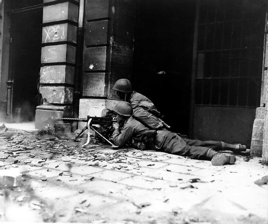 Troops of US 26th Infantry Division in the streets of Aachen, Germany, 15 October 1944 (US Army photo)