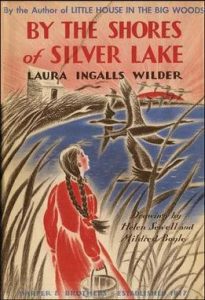 First edition cover of By the Shores of Silver Lake by Laura Ingalls Wilder