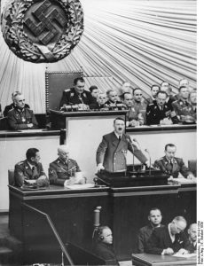 Adolf Hitler giving a speech to the Reichstag, Kroll Opera House, Berlin, Germany, in which he calls for peace talks, 6 Oct 1939 (German Federal Archive: Bild 183-E11354)