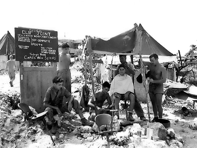 Barber shop set up by a Marine on Peleliu, Palau Islands, 11 October 1944 (US Marine Corps photo 98027)