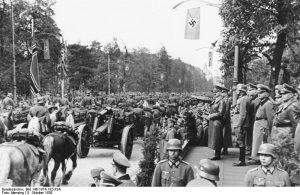 Adolf Hitler at a German military parade in Warsaw, Poland, 5 Oct 1939 (German Federal Archive: Bild 146-1974-132-33A/ Mensing)