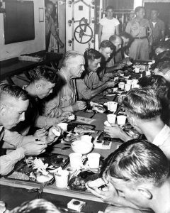 Adm. William Halsey having Thanksgiving dinner with the crew of battleship USS New Jersey, his flagship, Nov 1944 (US National Archives: 80-G-291498)