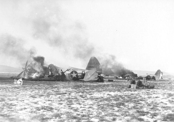 Destroyed US P-47 fighter planes at Metz-Frescaty Airfield, France, 1 Jan 1945 (US Army Air Force photo)