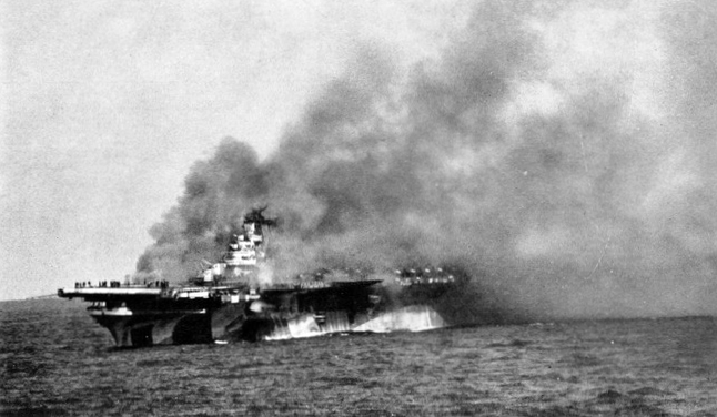 Carrier USS Ticonderoga burning after being hit by two kamikazes off Luzon, 21 Jan 1945 (US Navy photo)