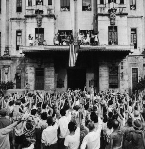 Internees at the University of Santo Tomas in the Philippines celebrate their liberation, February 1945. (LIFE, public domain)