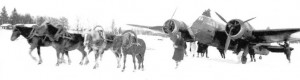 Blenheim light bomber of the RAF being towed away by horses after landing on the frozen Jukajärvi lake, near Juva village, Finland, 25 Feb 1940 (public domain via WW2 Database)