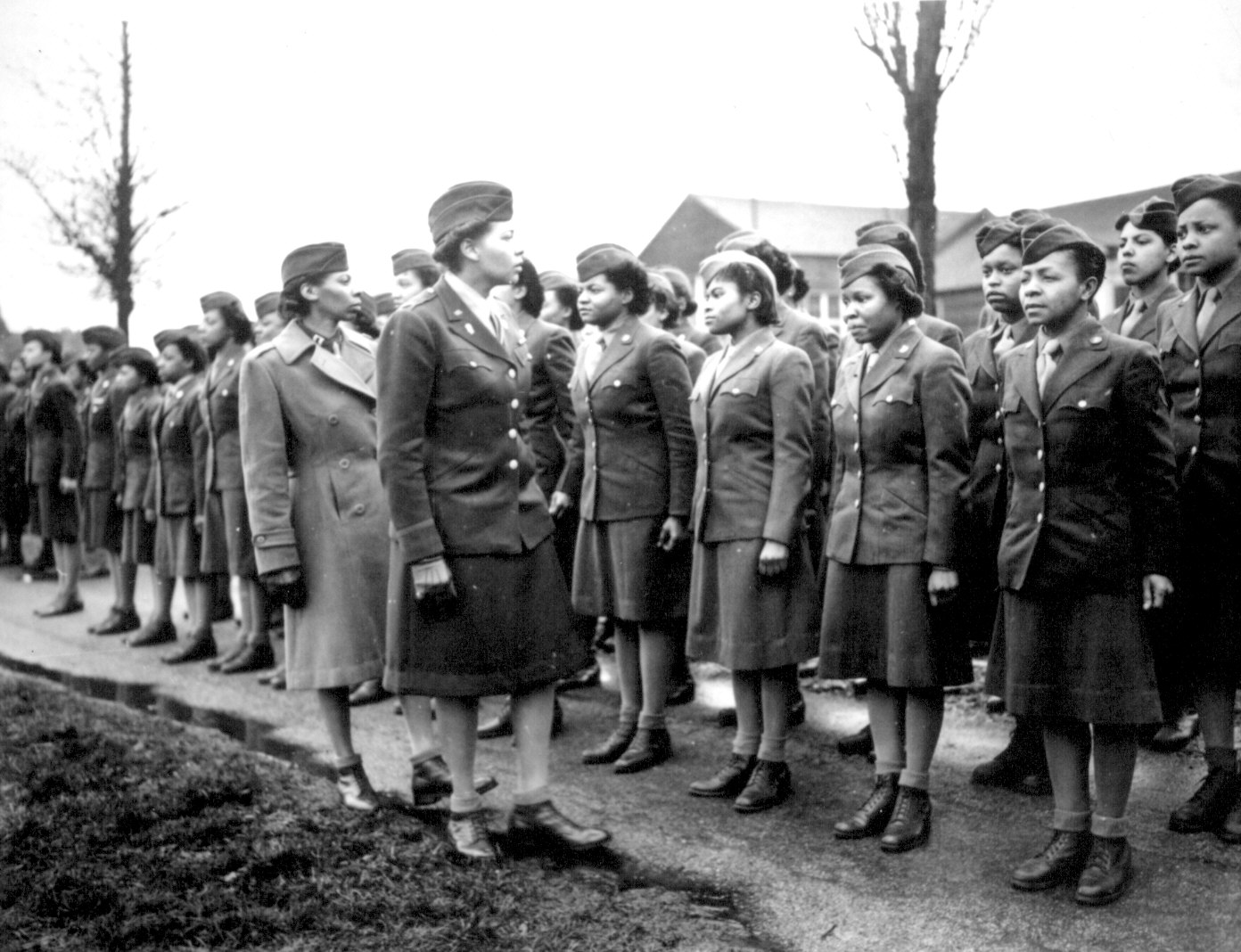 WAC Major Charity E. Adams and Captain Abbie N. Campbell inspecting members of the 6888th Central Postal Directory Battalion, England, 15 Feb 1945 (US National Archives: 111-SC-20079)