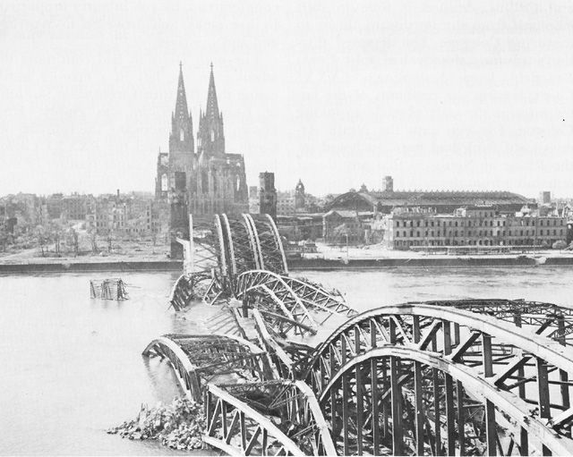 Demolished Hohenzollern Bridge at Cologne, Germany, March 1945 (US Army Center of Military History)