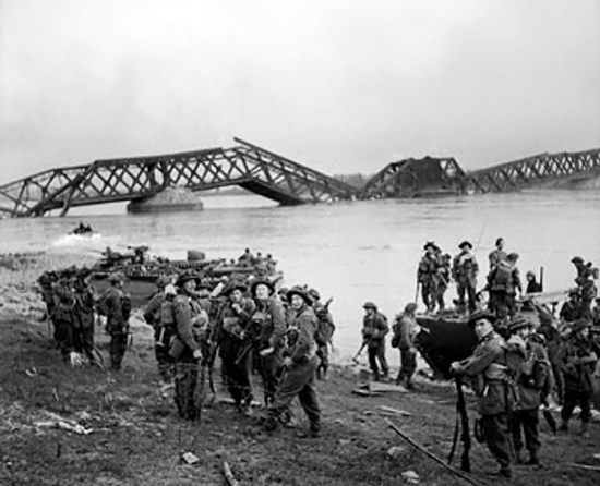Men of the British 1st Cheshire Regiment crossing the Rhine River with Buffalo tracked landing vehicles at Wesel, Germany, 24 Mar 1945. (Imperial War Museum: 4700-30 BU 2336)
