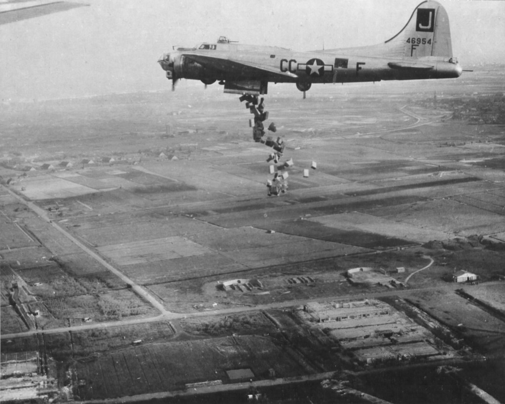 B-17G Fortress “Liquid-8-Or” of 569th Bomb Squadron dropping cases of “10 in 1” rations into Holland during Operation Chowhound aimed at breaking the famine in western Holland, May 1 or 3 1945 (US Air Force Historical Research Agency via Wikipedia)