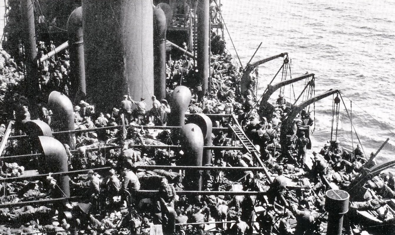 Allied troops aboard the ship Guinean after being evacuated from Dunkirk, late May 1940 (public domain via WW2 Database)