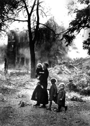 A Dutch family in a devastated town after the German invasion, May 1940 (public domain via WW2 Database) 