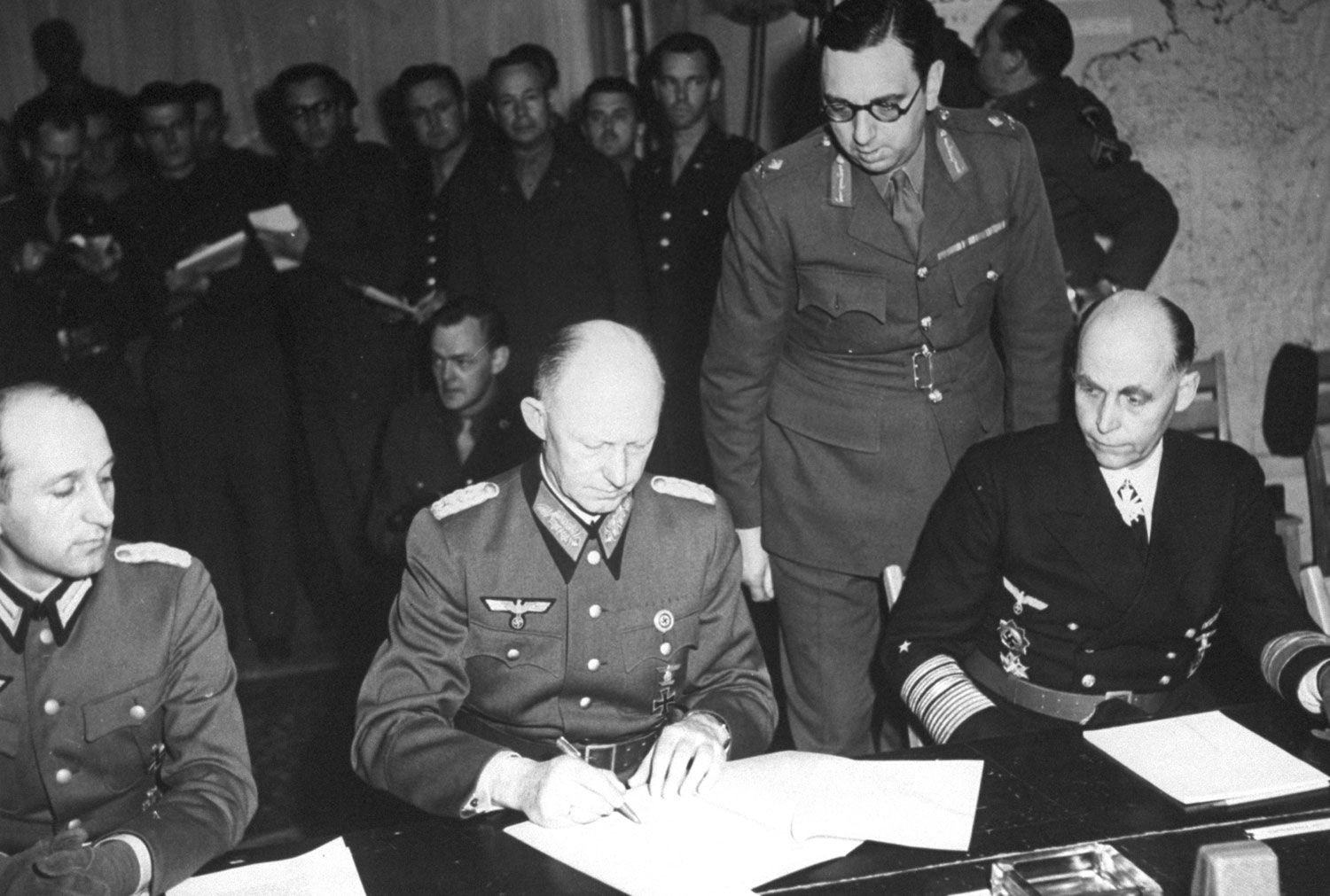 ColGen Alfred Jodl signing the documents of Germany’s surrender, Reims, France, 7 May 1945. (US Army Signal Corps photo)