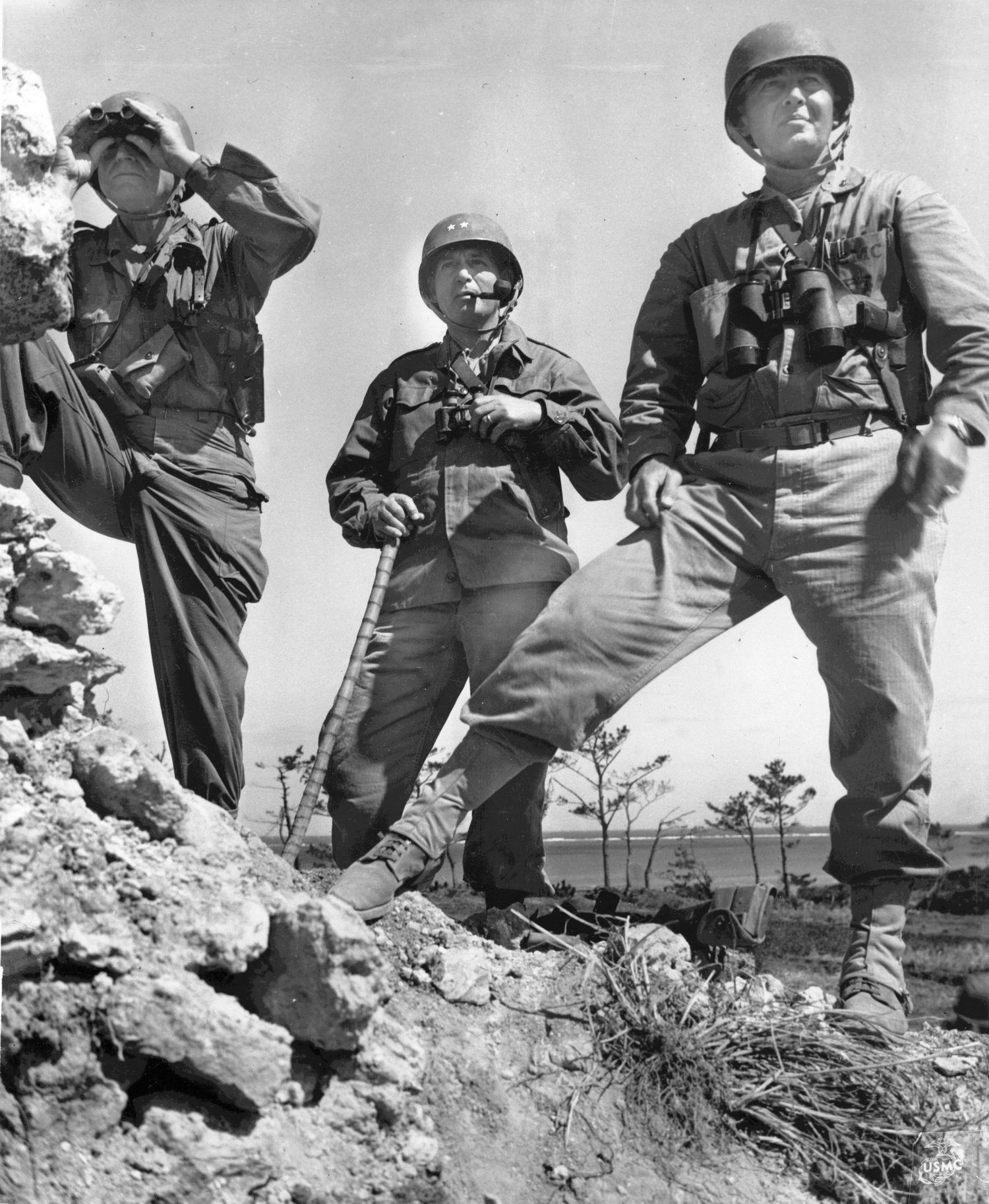 Lt. Gen. Simon Buckner, Jr., Maj. Gen. Lemuel Shepperd, and Brig. Gen. William Clement on Okinawa, 22 May 1945 (US Marine Corps photo)