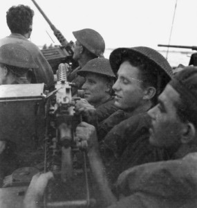 Soldiers of the Australian 2/43rd Battalion on a landing vehicle at Labuan Island in Brunei Bay, 10 June 1945 (Australian War Memorial: 108852)