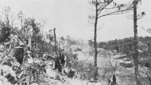 Yuza-Dake Hill, under attack by US 382nd Infantry, 96th Division. Tanks are working on the caves and tunnel system at base of ridge, June 1945 (US Army Center of Military History)