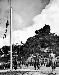 Raising the US flag on Okinawa, Japan, 22 Jun 1945 (US Army photo)