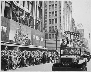 Gen. George Patton acknowledging the cheers of the welcoming crowds in Los Angeles, California, 9 Jun 1945 (US National Archives: ARC 535941)