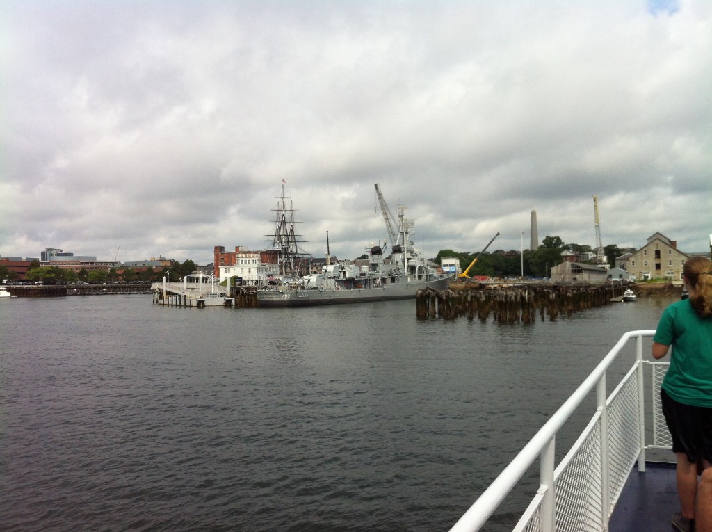 View of the Charlestown Navy Yard from the ferry, USS Cassin Young in the foreground, USS Constitution in the background. (Photo: Sarah Sundin, July 2014)
