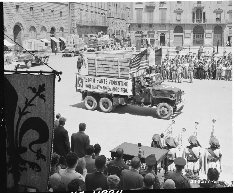 American trucks returning part of $500 million worth of Florentine artwork looted by Germans, Piazzo Dei Signoria, Florence, Italy, 21 Jul 1945 (US National Archives: 111-SC-210319)