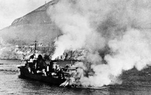 French destroyer leader Mogador burning after bombardment at Mers-el-Kebir, Algeria, 3 July 1940 (public domain via Wikipedia)