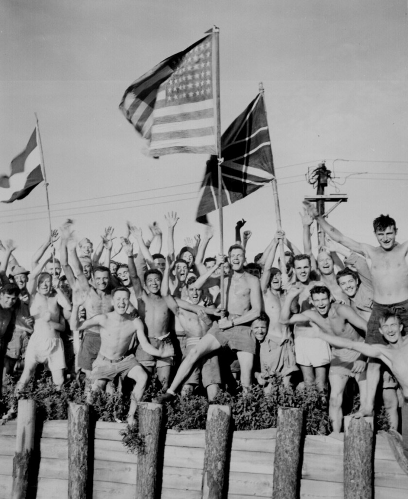 Allied prisoners of war at Omori camp near Yokohama cheer as US Navy and other Allied personnel arrive to rescue them, 29 Aug 1945 (US National Archives: 80-G-490444)