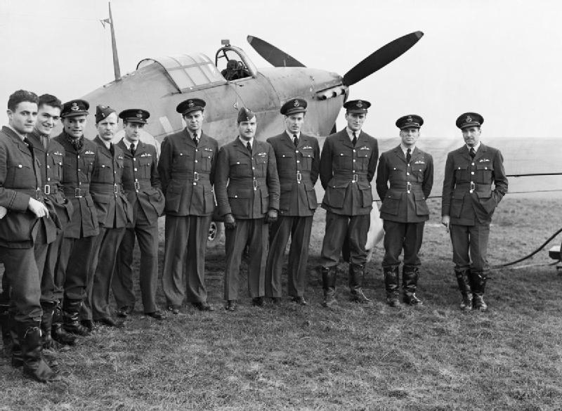 Pilots of No.1 Squadron RCAF with a Hawker Hurricane at Prestwick, Scotland, 30 October 1940 (Imperial War Museum: CH 1733)