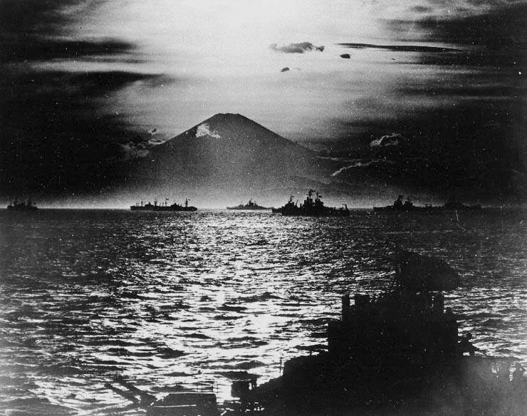 US and British warships in Sagami Bay, Japan, 27 Aug 1945; note Mount Fuji with setting sun in background; photo taken from battleship USS South Dakota (US National Archives: 80-G-490487)