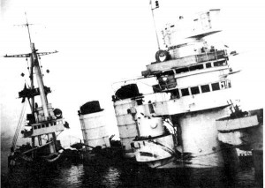 Italian battleship Conte di Cavour sinking in Taranto harbor, November 1940 (public domain via WW2 Database)