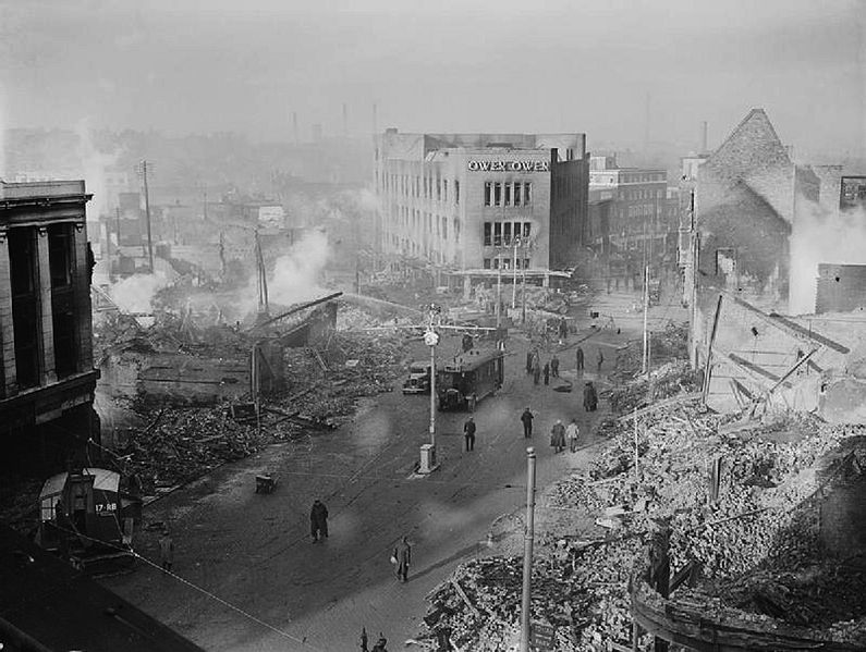 Broadgate in Coventry city centre following the Coventry Blitz of 14/15 November 1940. The burnt-out shell of the Owen Owen department store (which had only opened in 1937) overlooks a scene of devastation, 16 November 1940 (Imperial War Museum: H 5600)