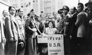 Filipino Americans celebrating their newly gained US citizenship which they had earned fighting for the US in World War II through the Nationality Act of 1940 (via Wikimedia Creative Commons)