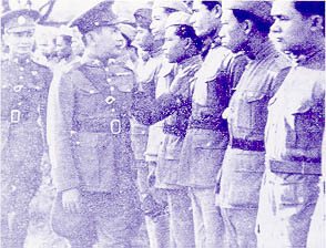 Thai Prime Minister Plaek Phibunsongkhram inspecting troops during the Franco-Thai War, 1941 (public domain via Wikipedia)