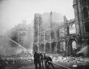 Firefighters putting out a blaze in London after an air raid during The Blitz in 1941 (US National Archives: 541902)