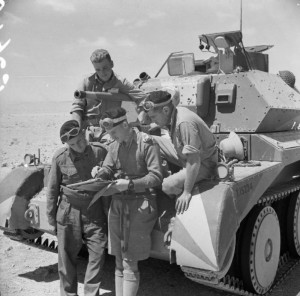 Crew of a British Cruiser Mk IV tank studying a map in the Western Desert, Egypt, 30 Apr 1941 (Imperial War Museum: E 2640)