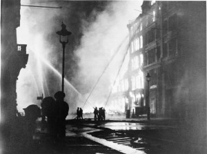 Members of the London Fire Brigade on Queen Victoria Street on the night of 10-11 May 1941, the last major raid in London’s Blitz (Imperial War Museum: HU 1129)