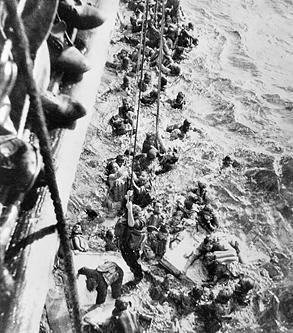 Survivors of battleship Bismarck being pulled aboard HMS Dorsetshire, 27 May 1941 (Imperial War Museum: 4700-26 ZZZ 3130C)