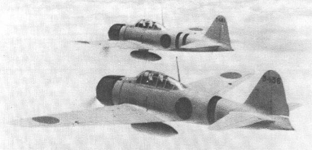 Two Japanese A6M2 Zero fighters en route to attack Nanzheng, China, 26 May 1941 (public domain via Wikipedia)