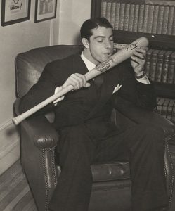 Joe DiMaggio kissing his bat, 15 Dec 1941 (Library of Congress)