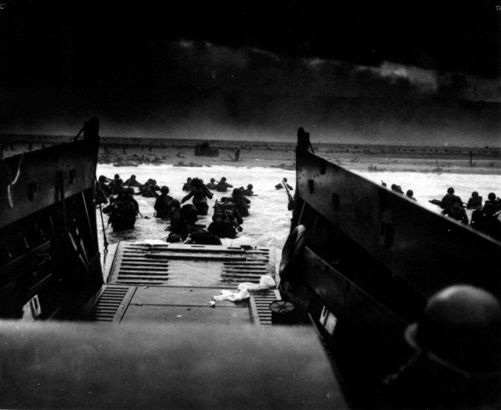 Troops of Company E, 16th Infantry, US 1st Infantry Division approach Fox Green section of Omaha Beach in an LCVP landing craft, Normandy, 6 Jun 1944 (US National Archives: 195515)